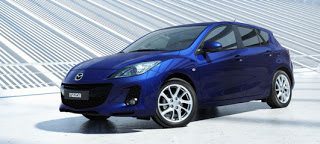 2012 Mazda 3 hatch front side angle