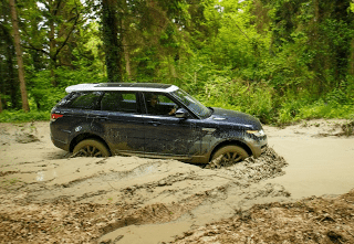 2013 Land Rover Range Rover Sport in mud