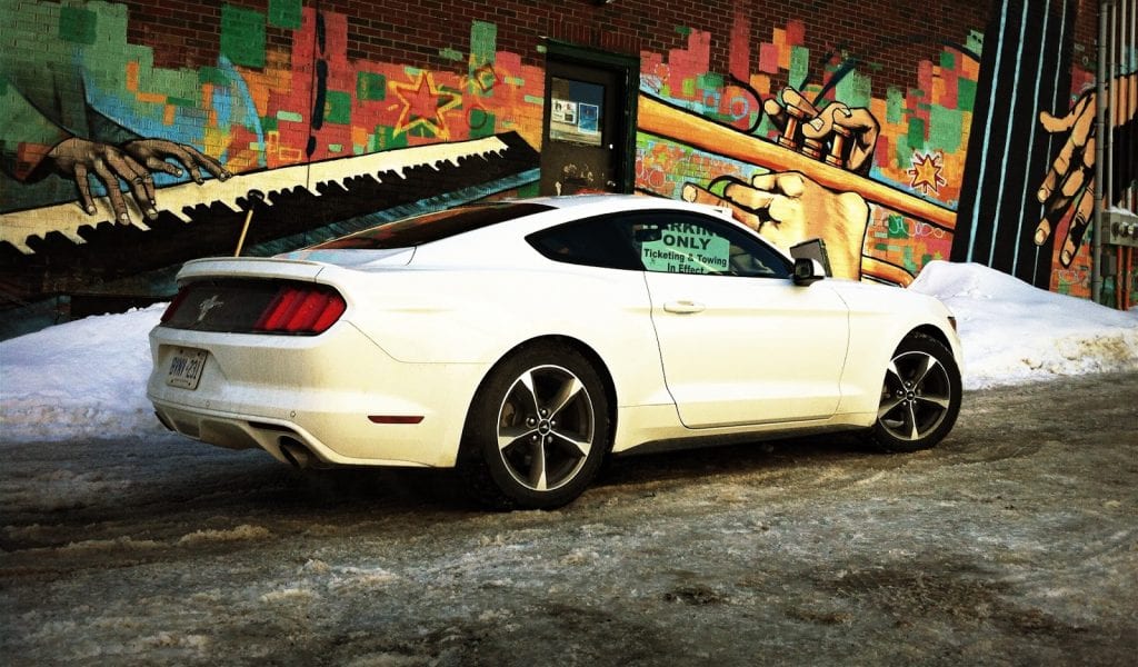 2015 Ford Mustang V6 rear three quarter white