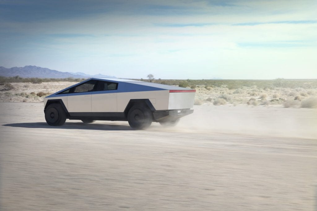 Tesla Cybertruck driving in the desert
