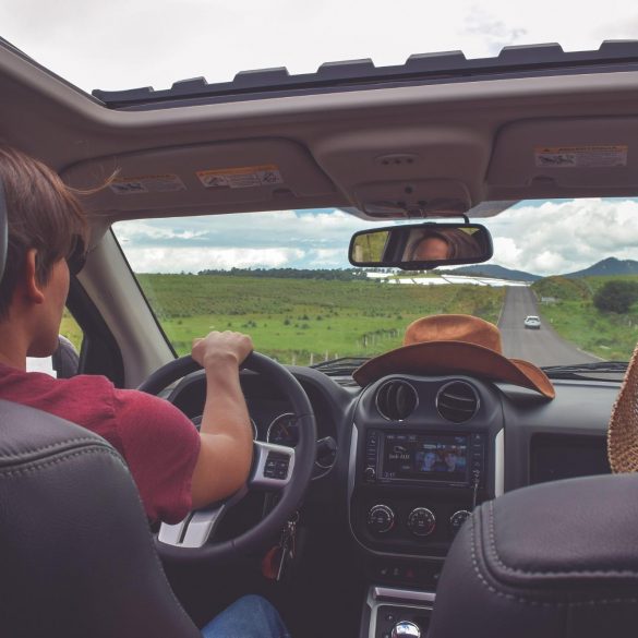 a man driving his car