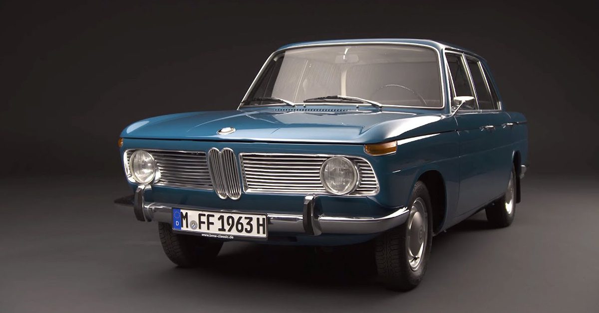 A Blue 1962 BMW 1500 on a stage floor