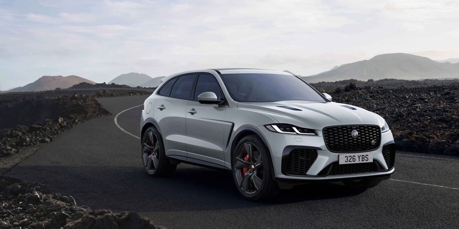 2022 silver Jaguar F-Pace SUV with mountain background