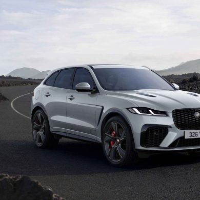2022 silver Jaguar F-Pace SUV with mountain background