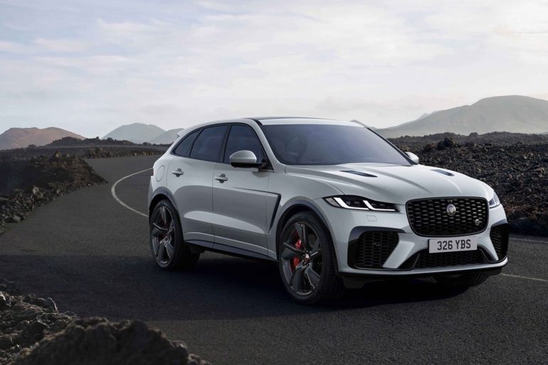 2022 silver Jaguar F-Pace SUV with mountain background