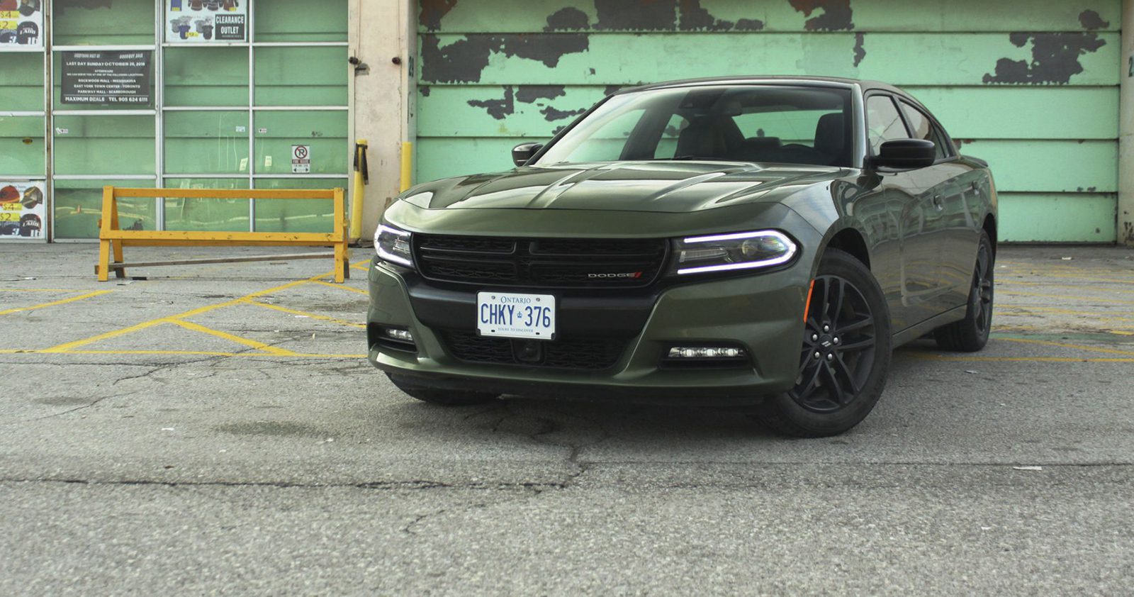 2022 green Dodge Charger in a parking area