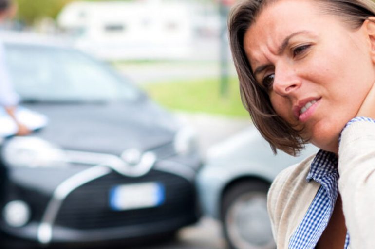 Woman with neck pain after a car accident