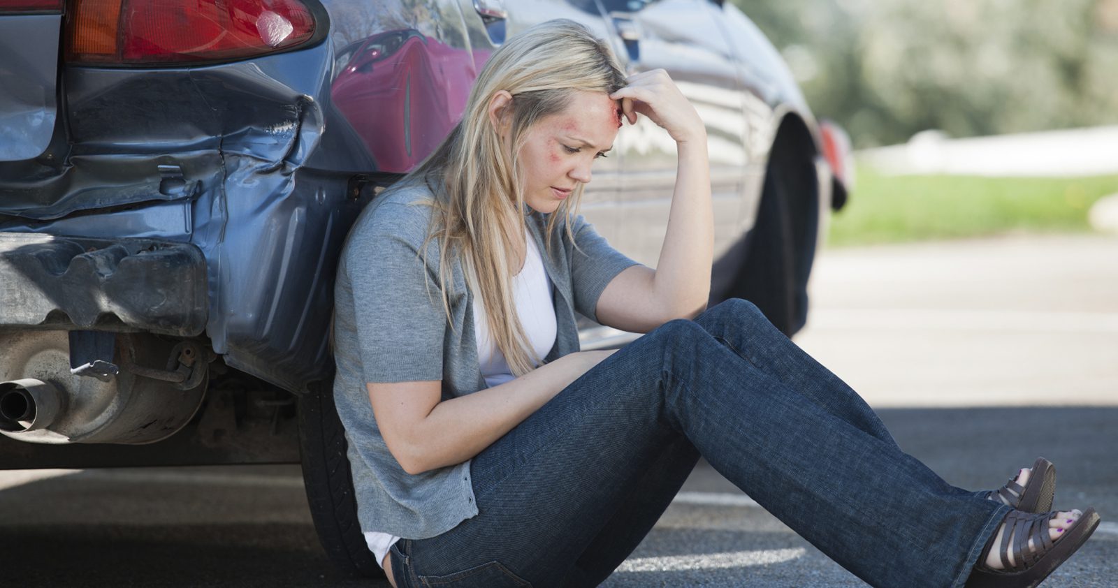 Woman in distress after a car accident