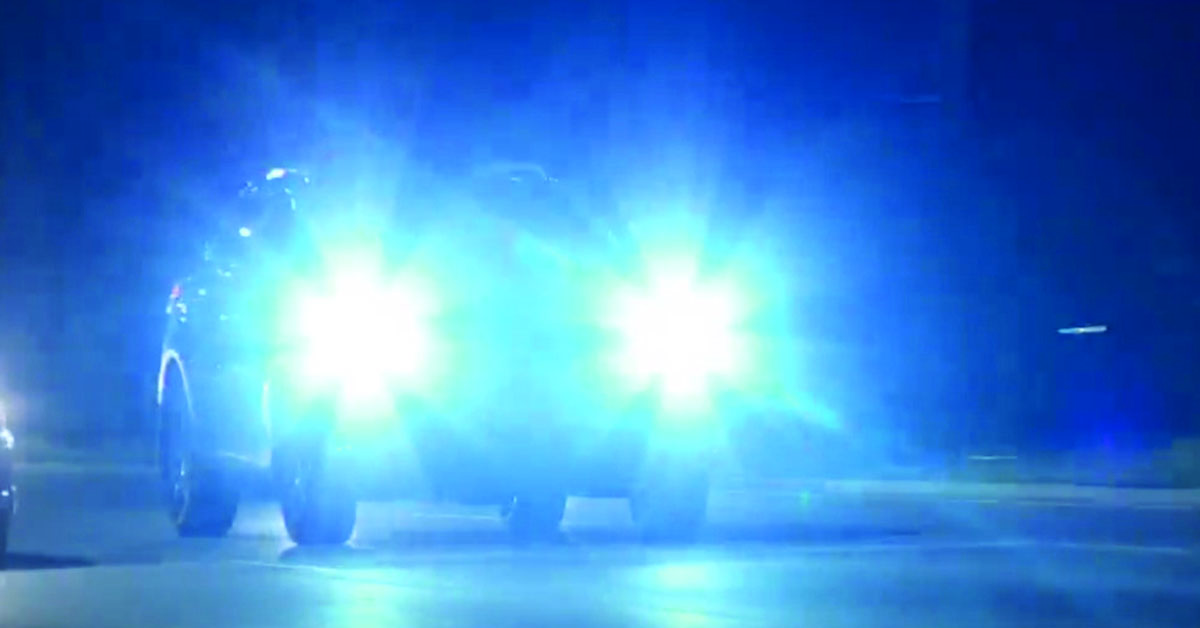 SUV at night with super bright headlights