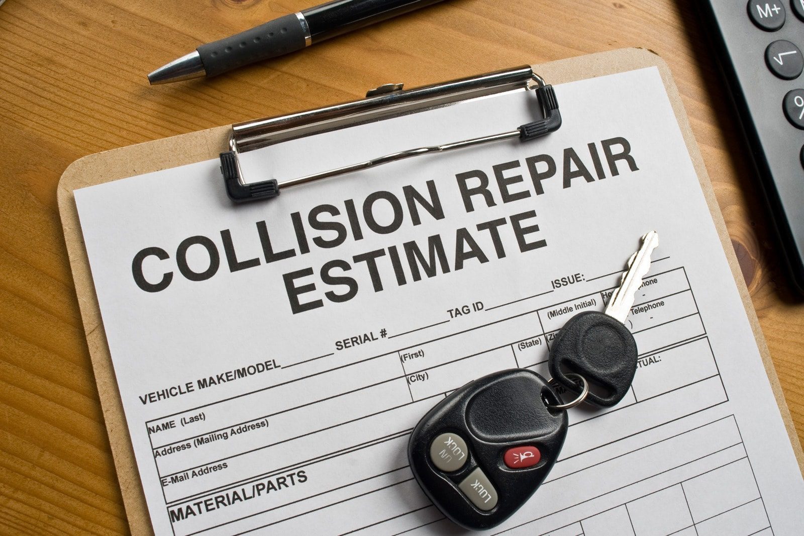 piece of paper showing collision repair estimate