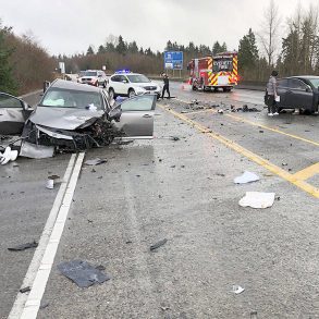 Vehicle collision on the highway at day