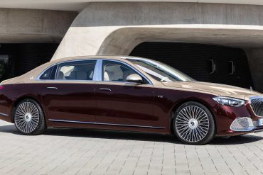 image showing the side profile of a two-tone (red & brown) Mercedes-Maybach S680
