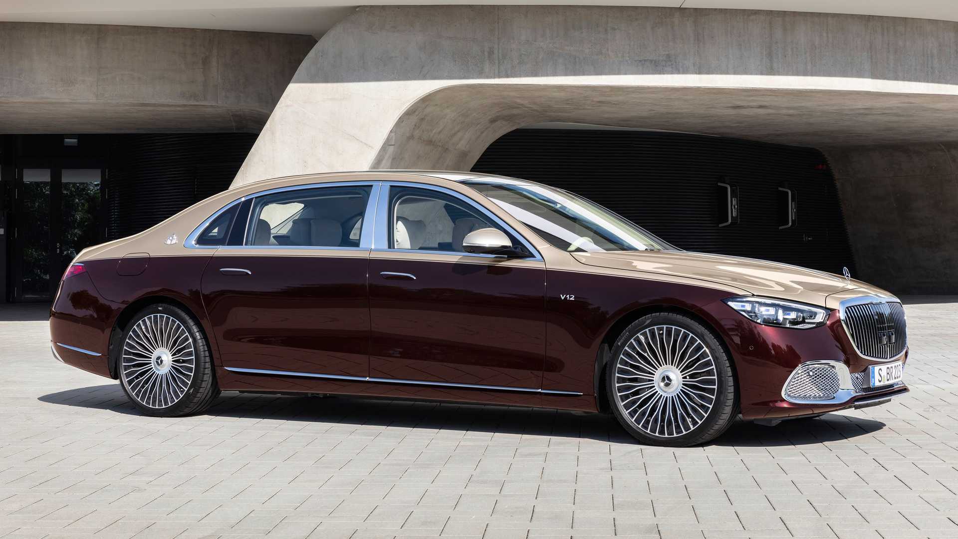 image showing the side profile of a two-tone (red & brown) Mercedes-Maybach S680