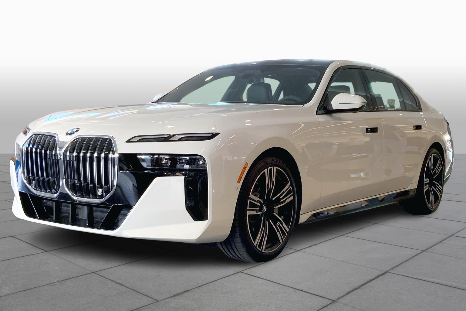 Front angled image of a white 2023 BMW 760i xDrive