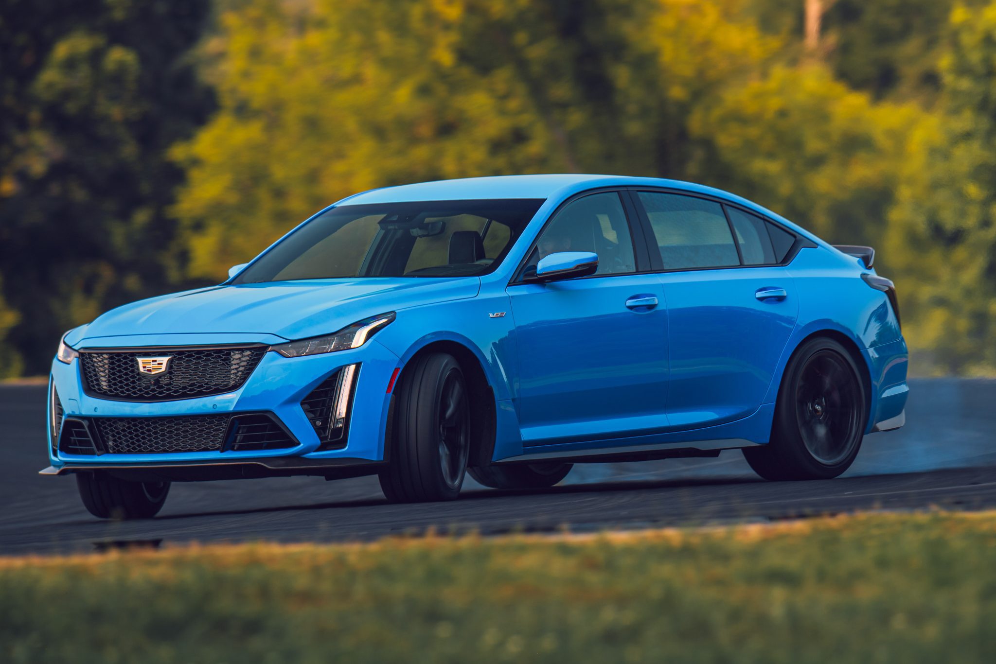 Side view of a 2023 blue Cadillac CT5 V Blackwing