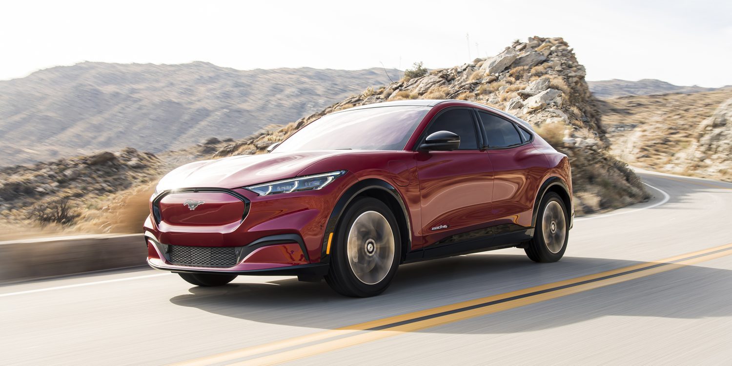 Three-quarter front view of a 2023 Ford red Mustang Mach e