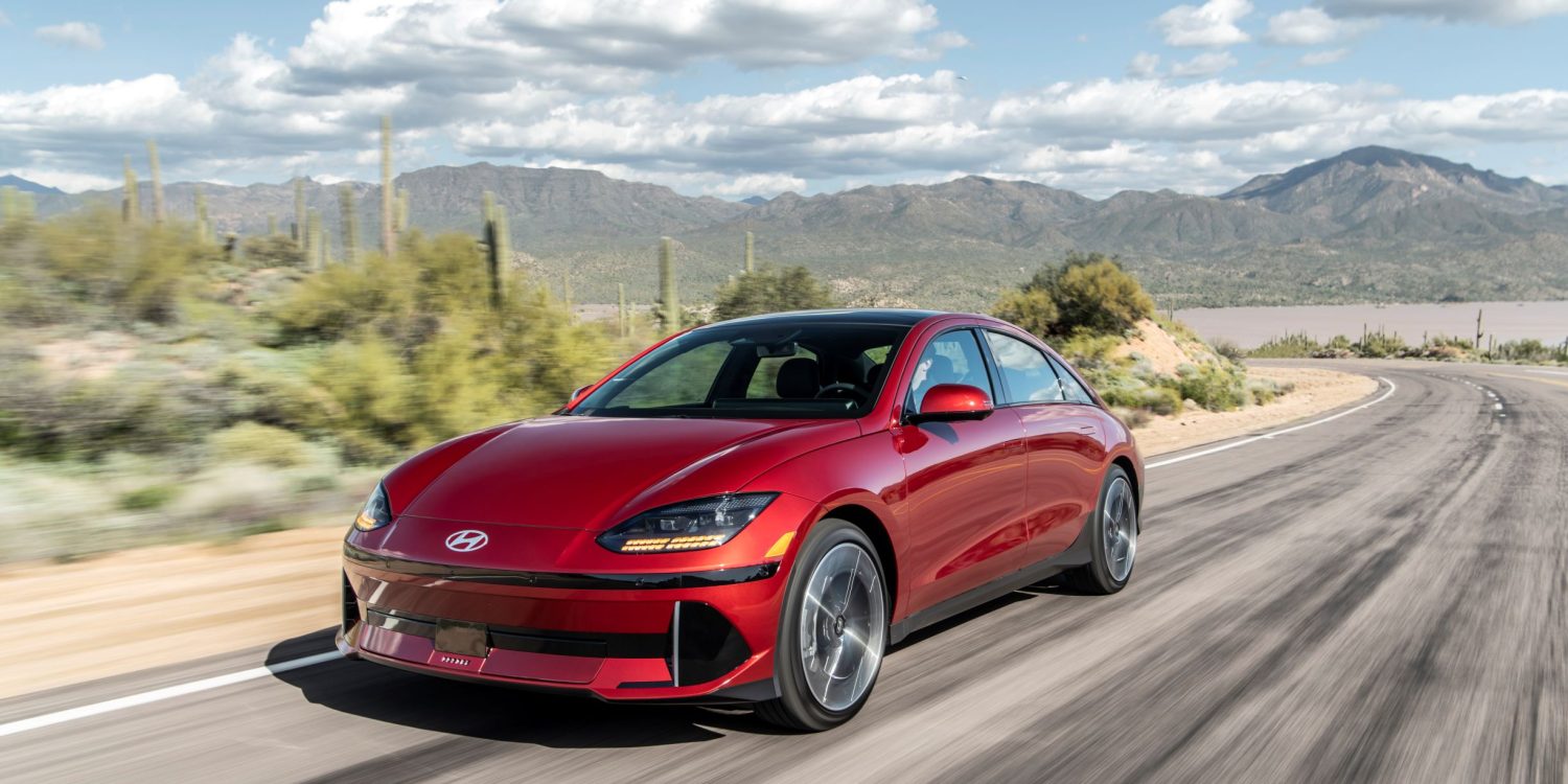 Three-quarter front view of a 2023 red Hyundai Ioniq 6