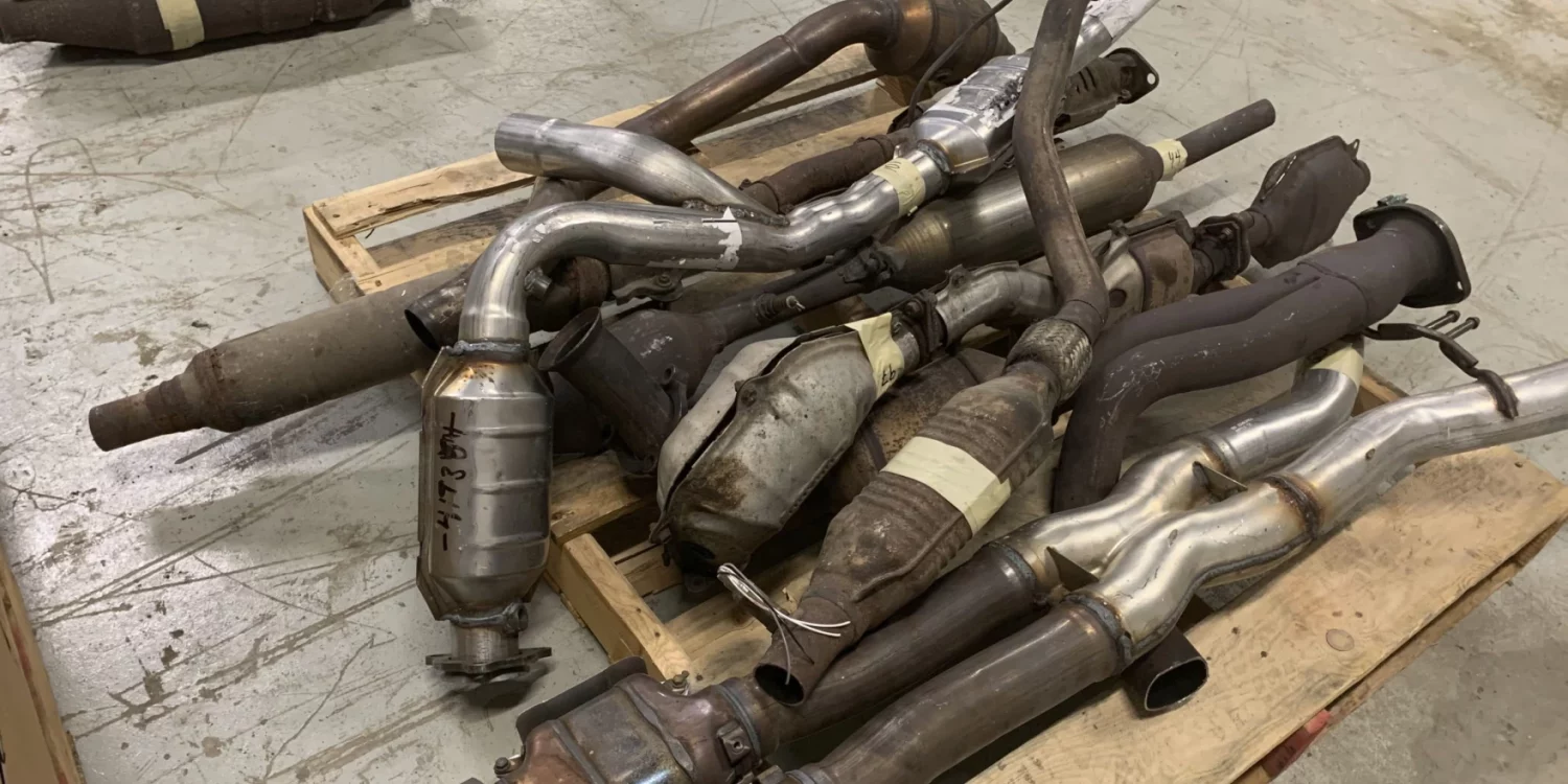 a pile of catalytic converters