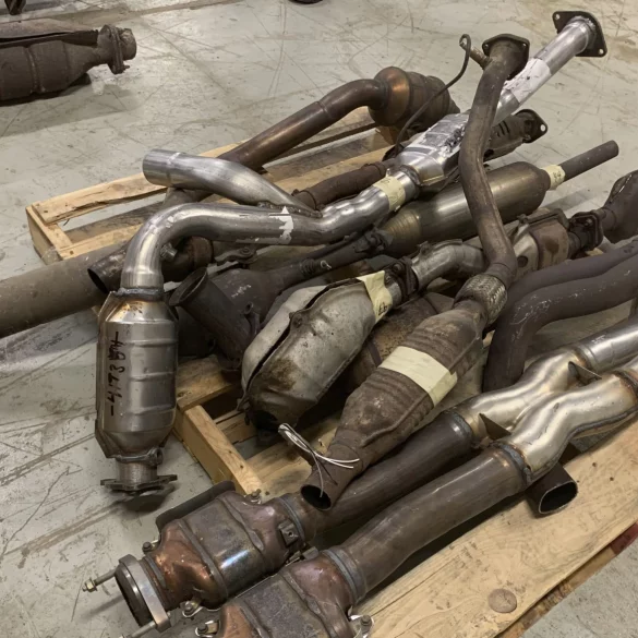 a pile of catalytic converters