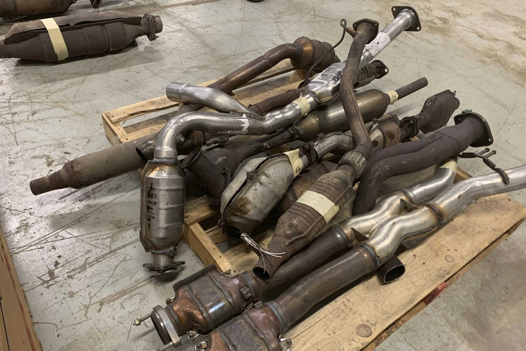 a pile of catalytic converters