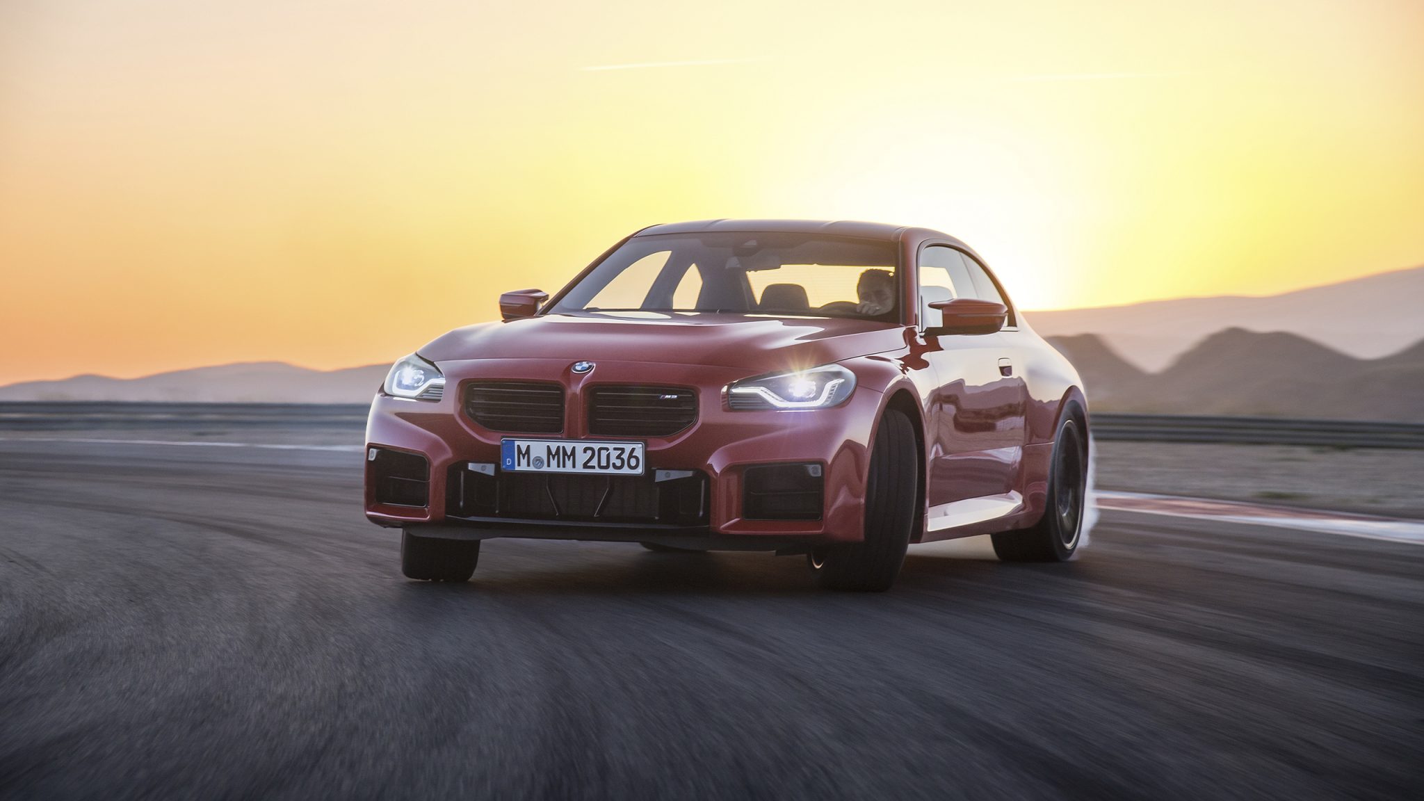 front view of a 2023 red BMW M2