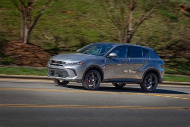 Side view of a 2023 grey Dodge Hornet