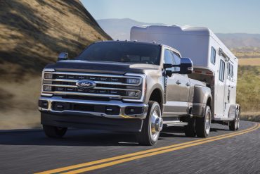 Three-quarter front view of a grey Ford F450 Super Duty