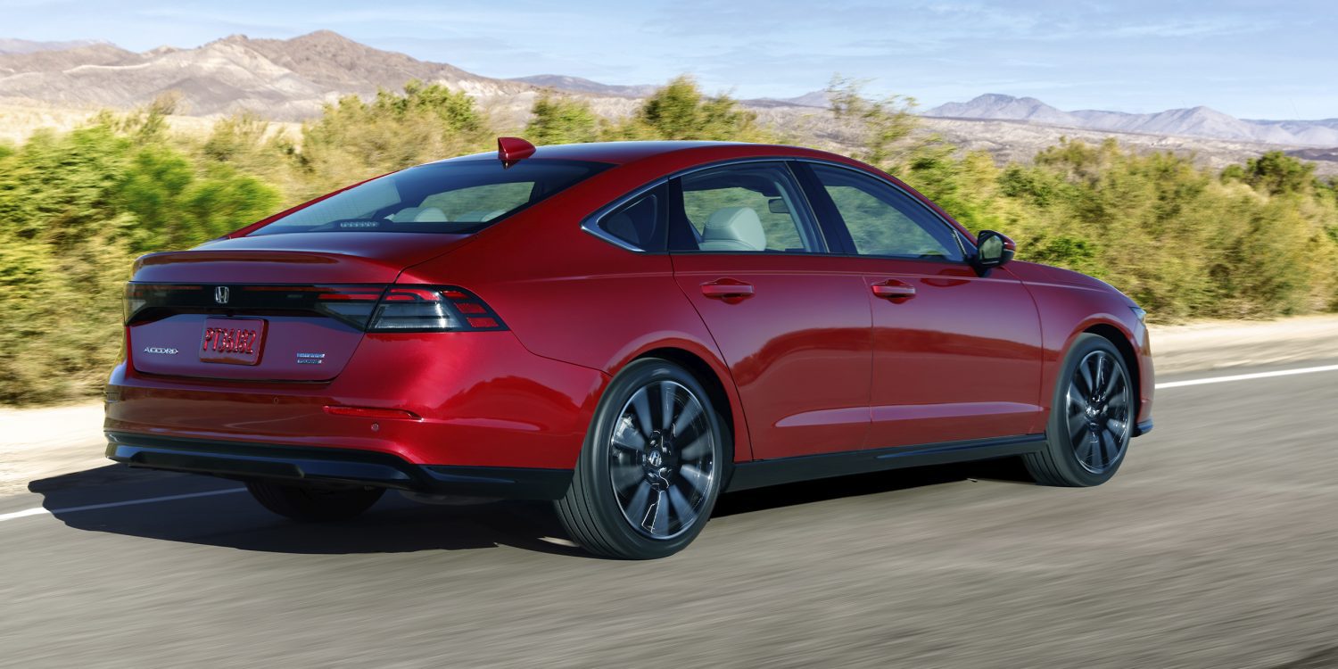 Three-quarter rear view of a 2023 red Honda Accord hybrid