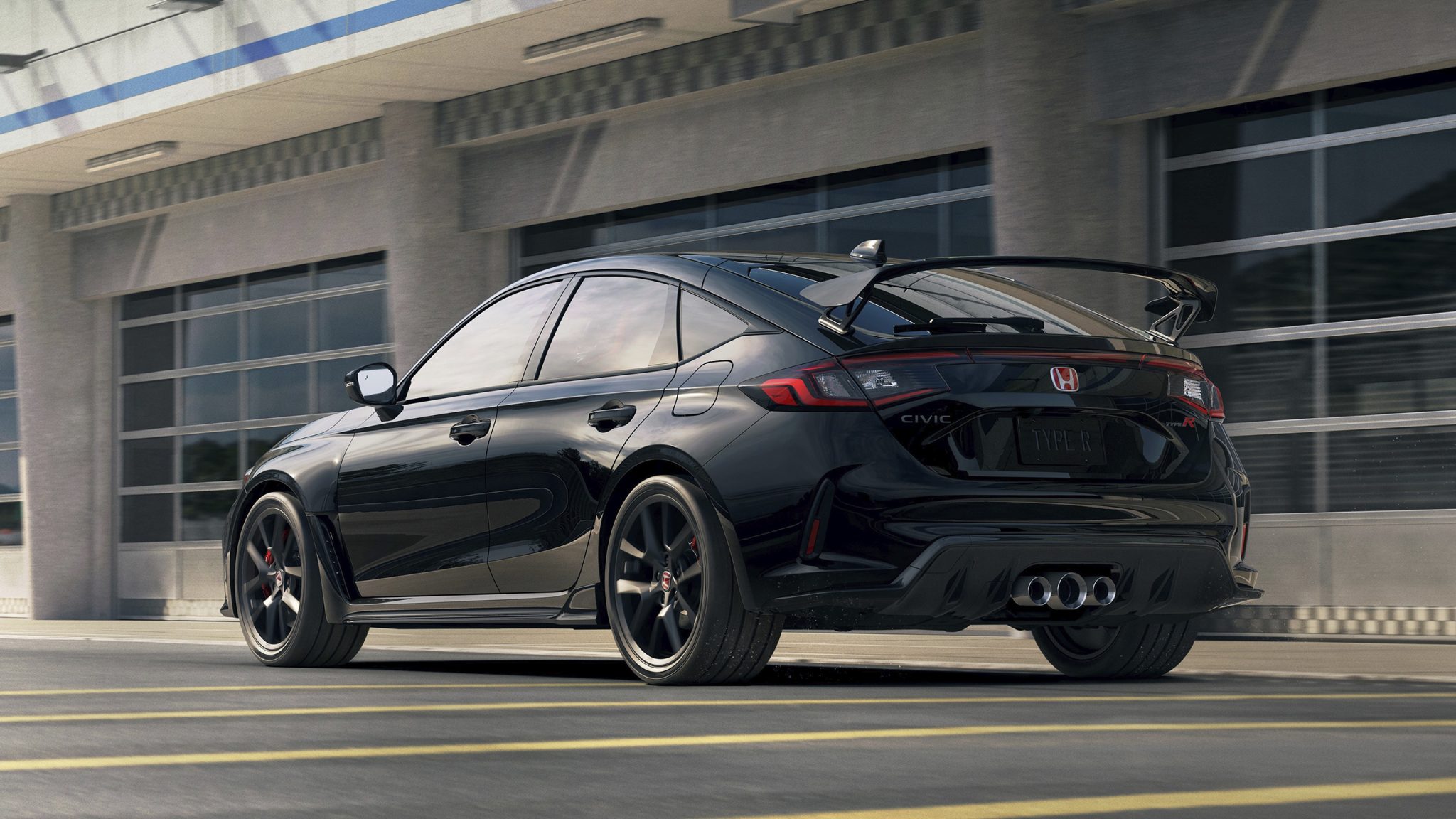 Three-quarter rear view of a 2023 black Civic Type R