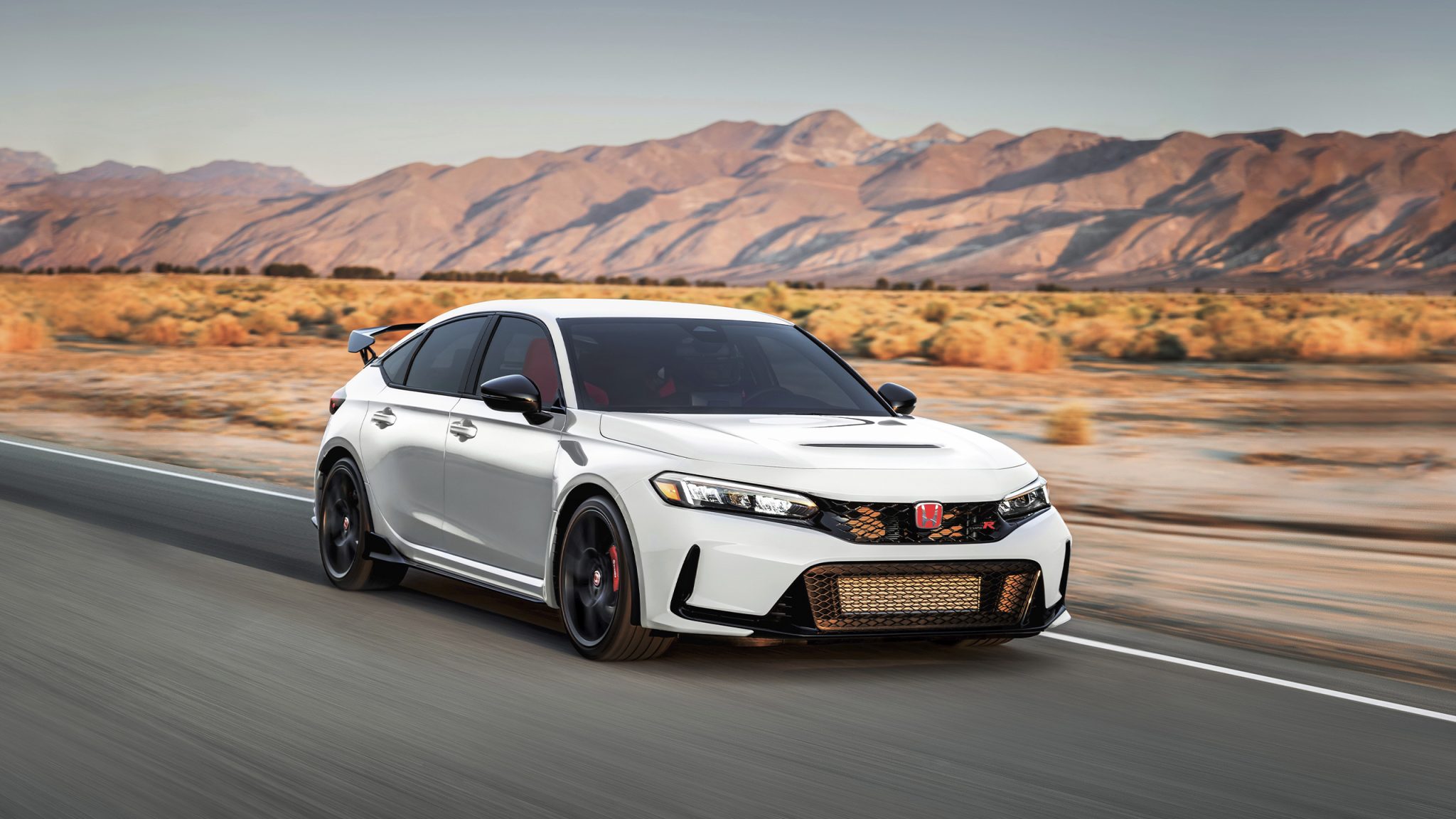 Three-quarter front view of a 2023 white Honda Civic Type-R
