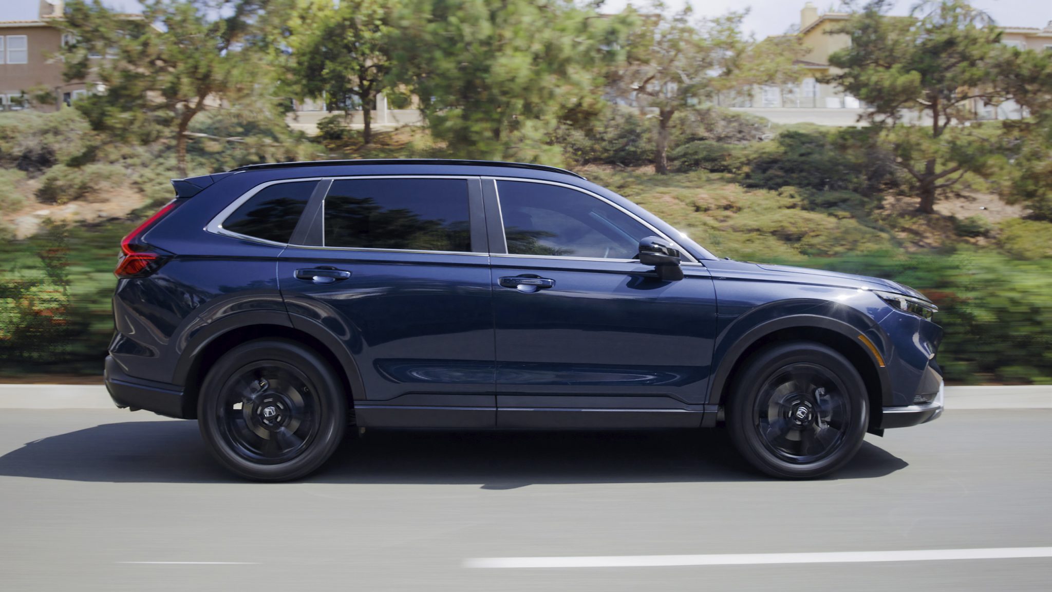 Side angle of a 2023 blue Honda CR-V
