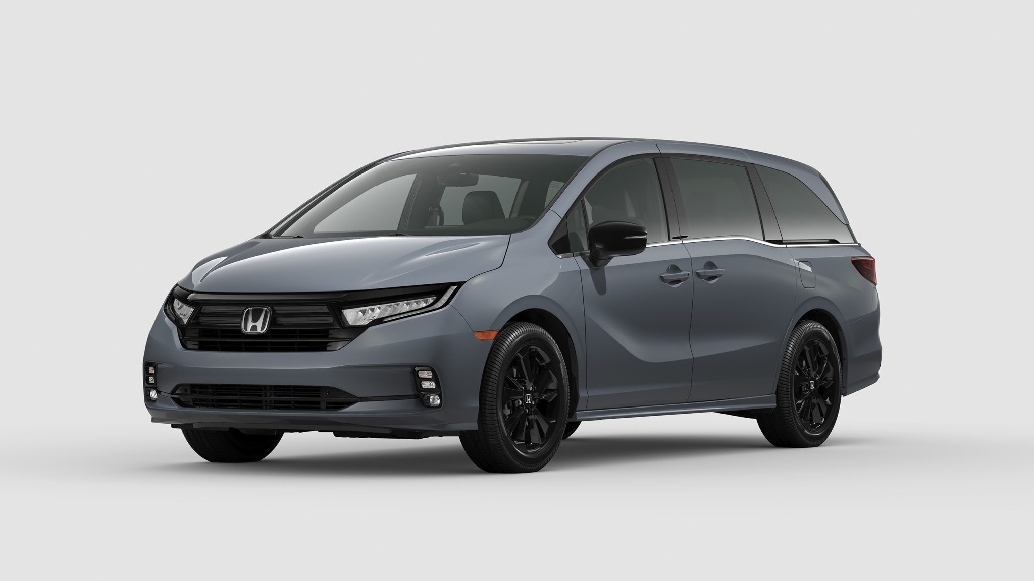 Three-quater front view of a 2023 greay Honda Odyssey