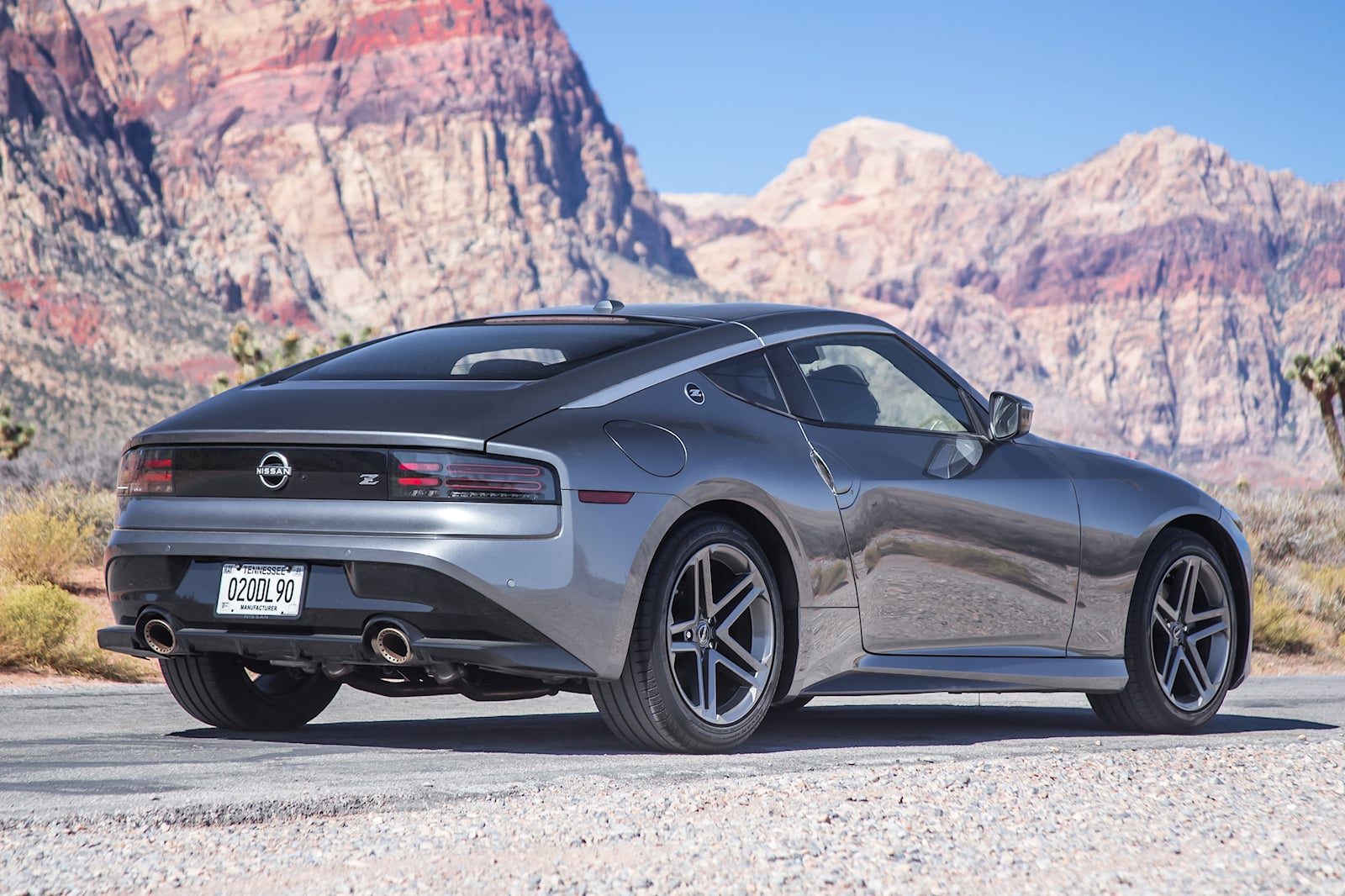 rear angled view of a grey Nissan Z