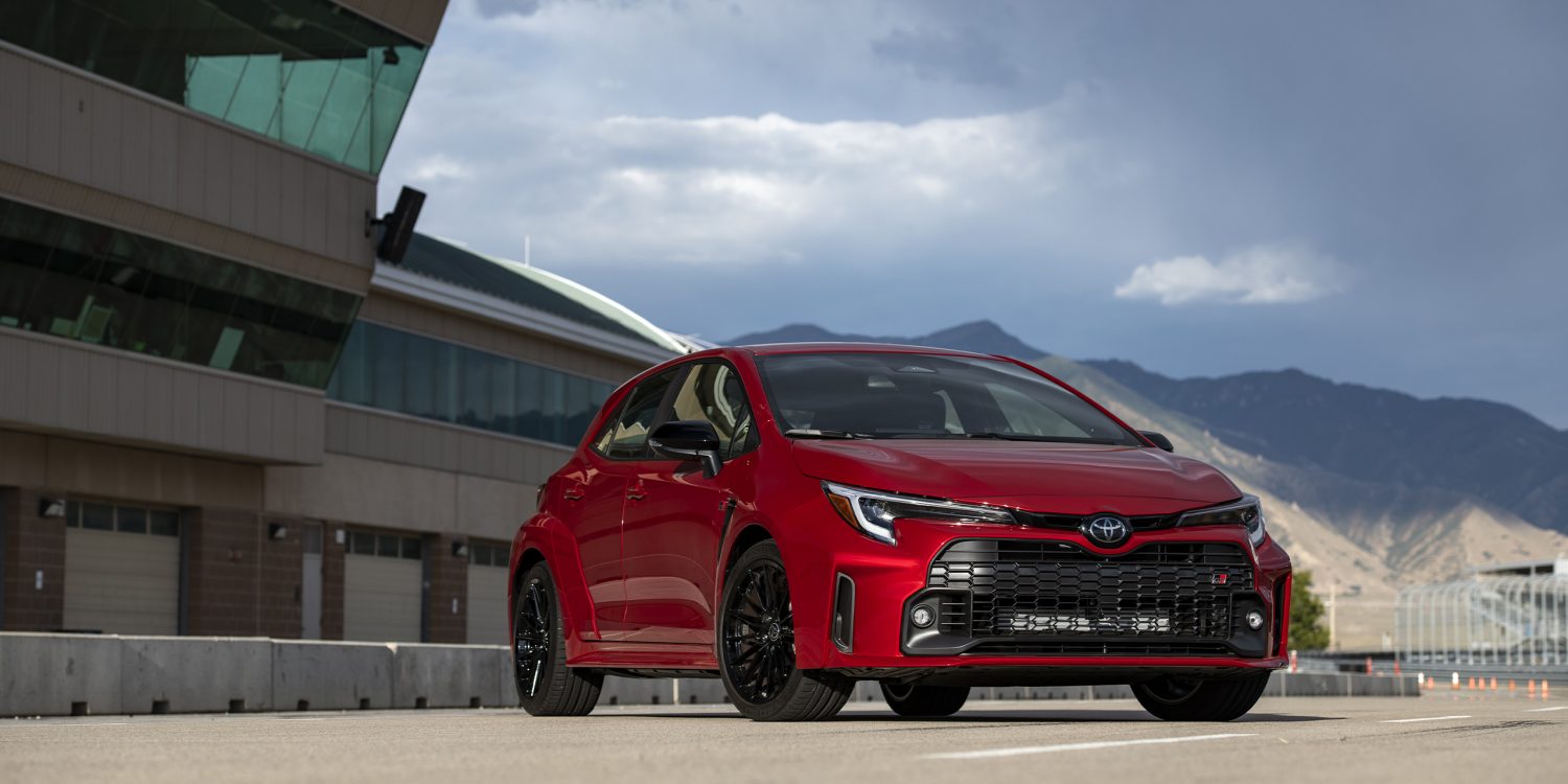 Three-quarter front view of a 2023 red Toyota GR Corolla