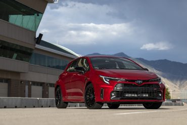 Three-quarter front view of a 2023 red Toyota GR Corolla