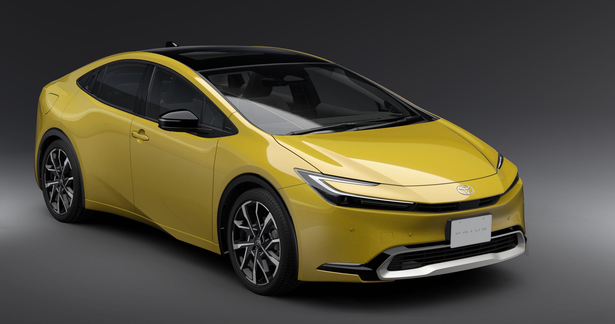 three-quarter-front view of a 2023 yellow Toyota Prius