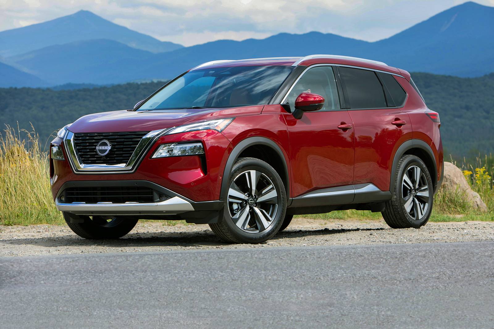 front angled view of a red 2023 Nissan Rogue