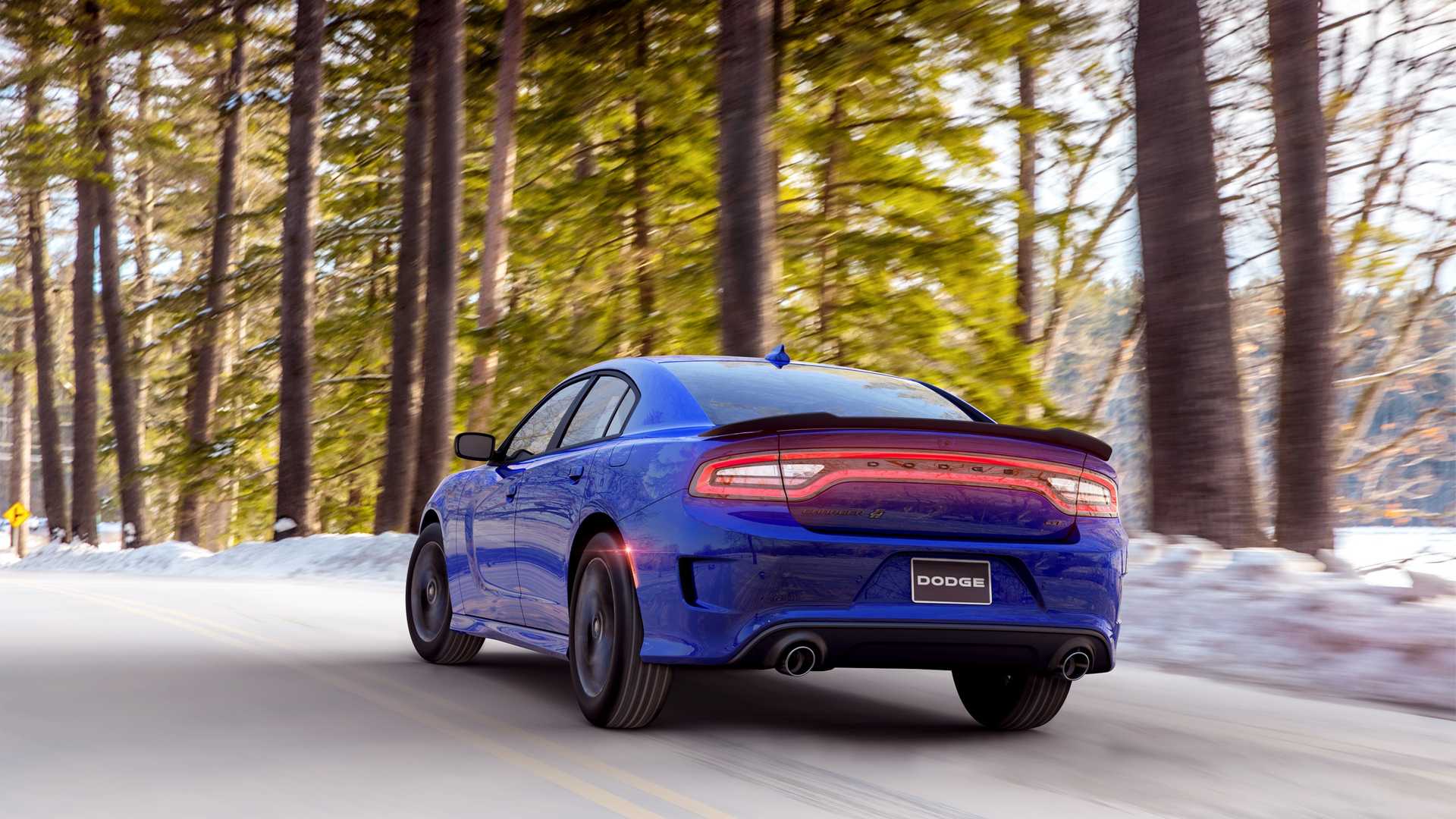 Rear angled view of a blue Dodge Charger GT