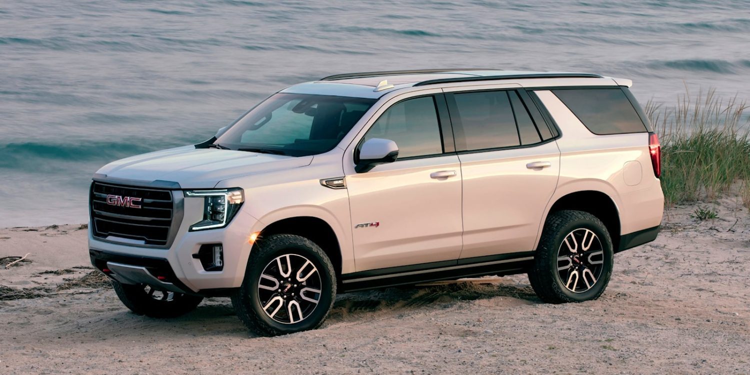 front angled view of a white 2023 GMC Yukon