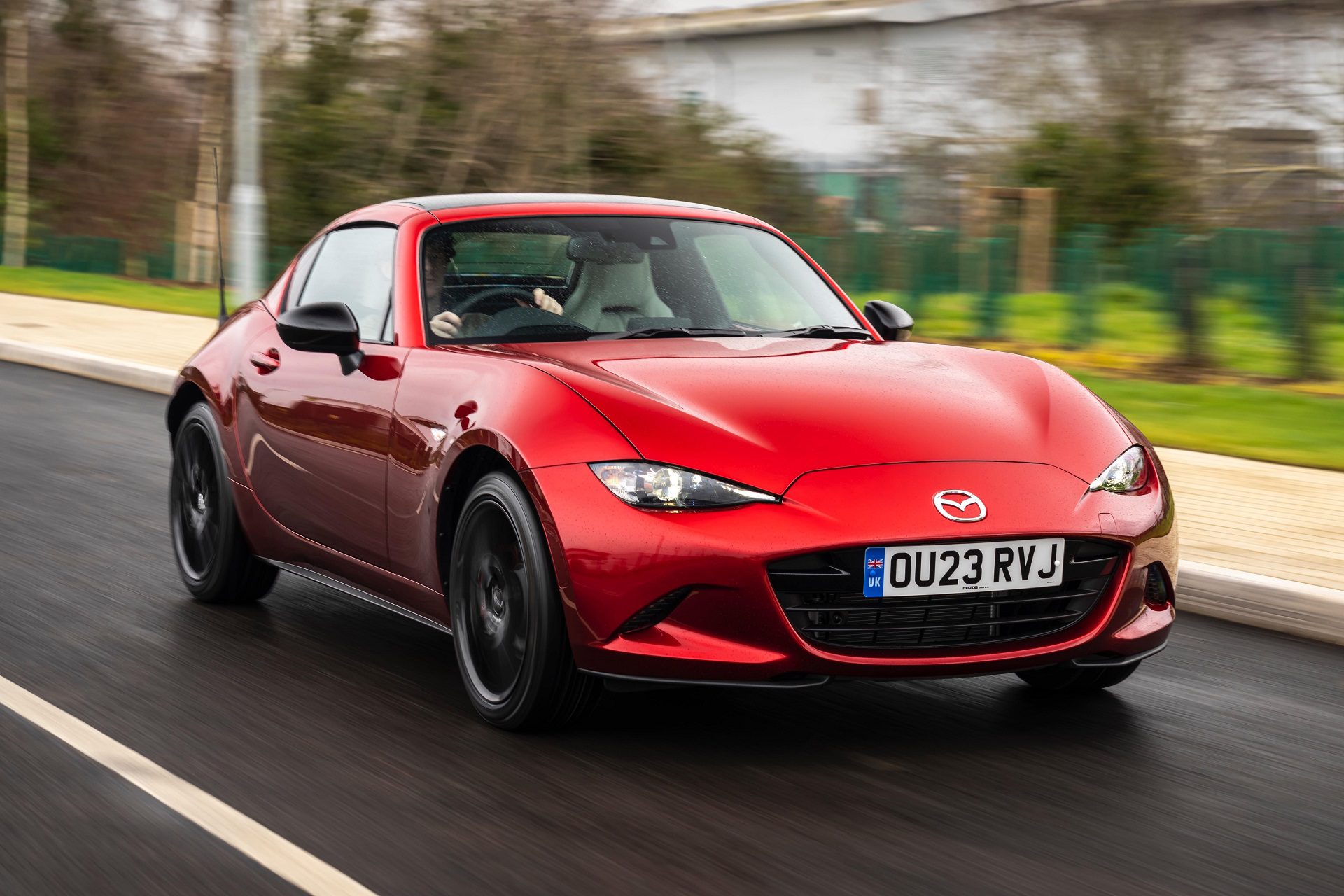 Front angled view of a red 2023 Mazda MX-5 Miata