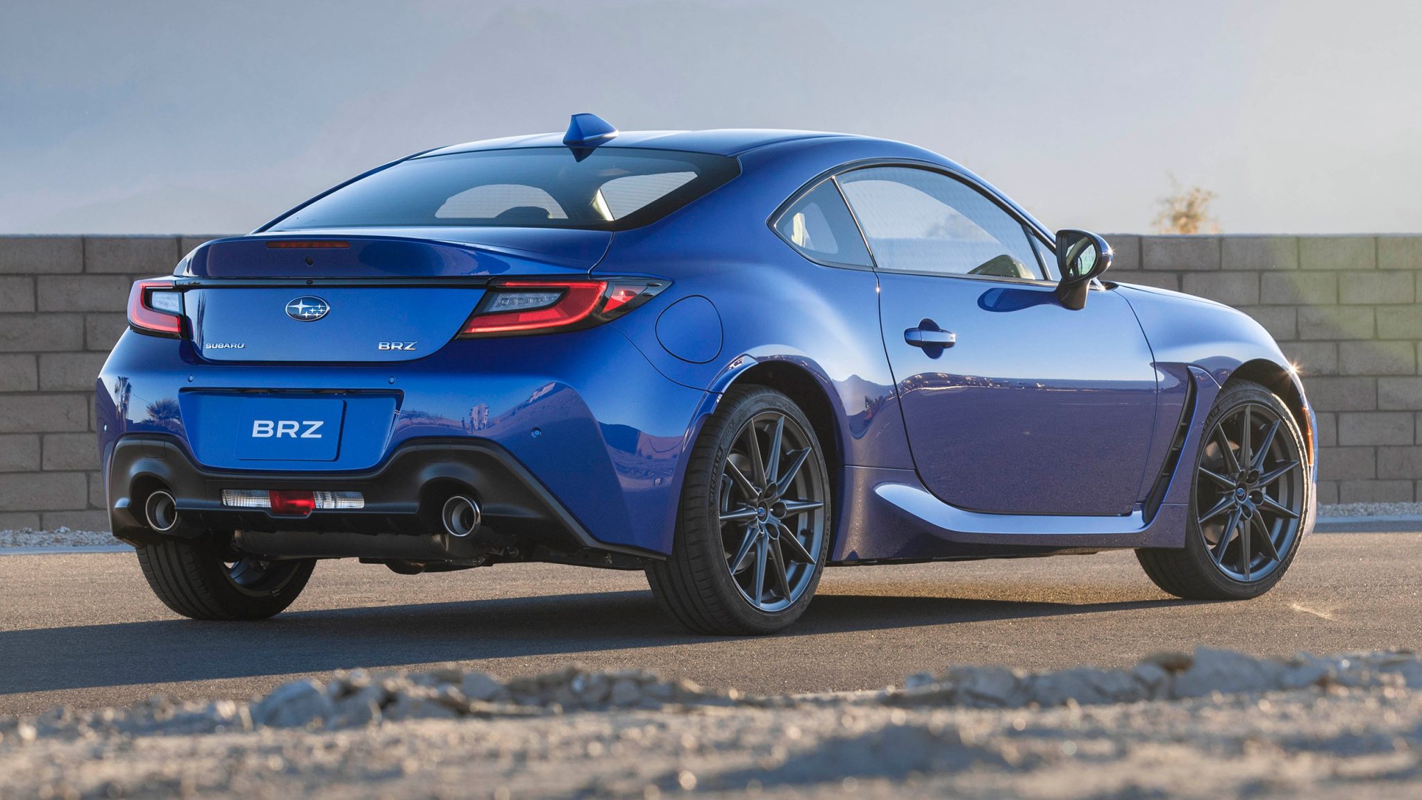 Rear angled view of a blue 2023 Subaru BRZ