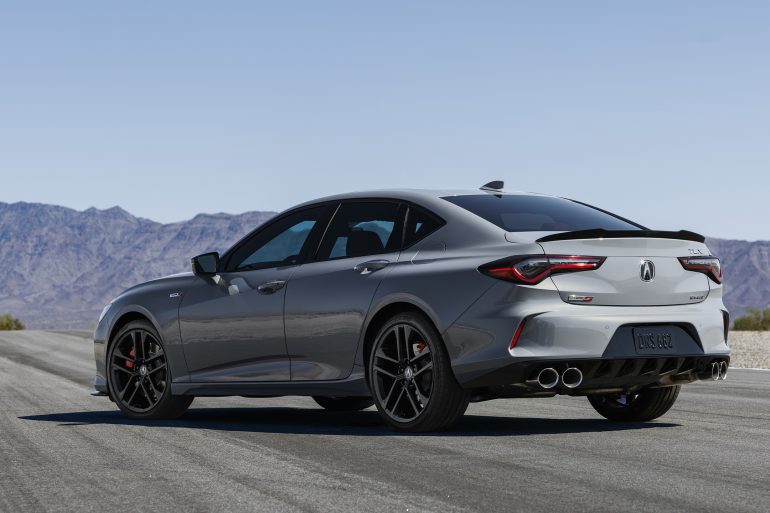 Three-quarter rear view of a 2023 gray Acura TLX Type S