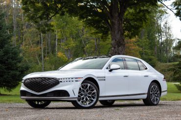Front-angled view of a white 2023 Genesis G90