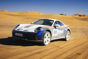Three-quarter front view of a 2023 Porsche 911 Dakar