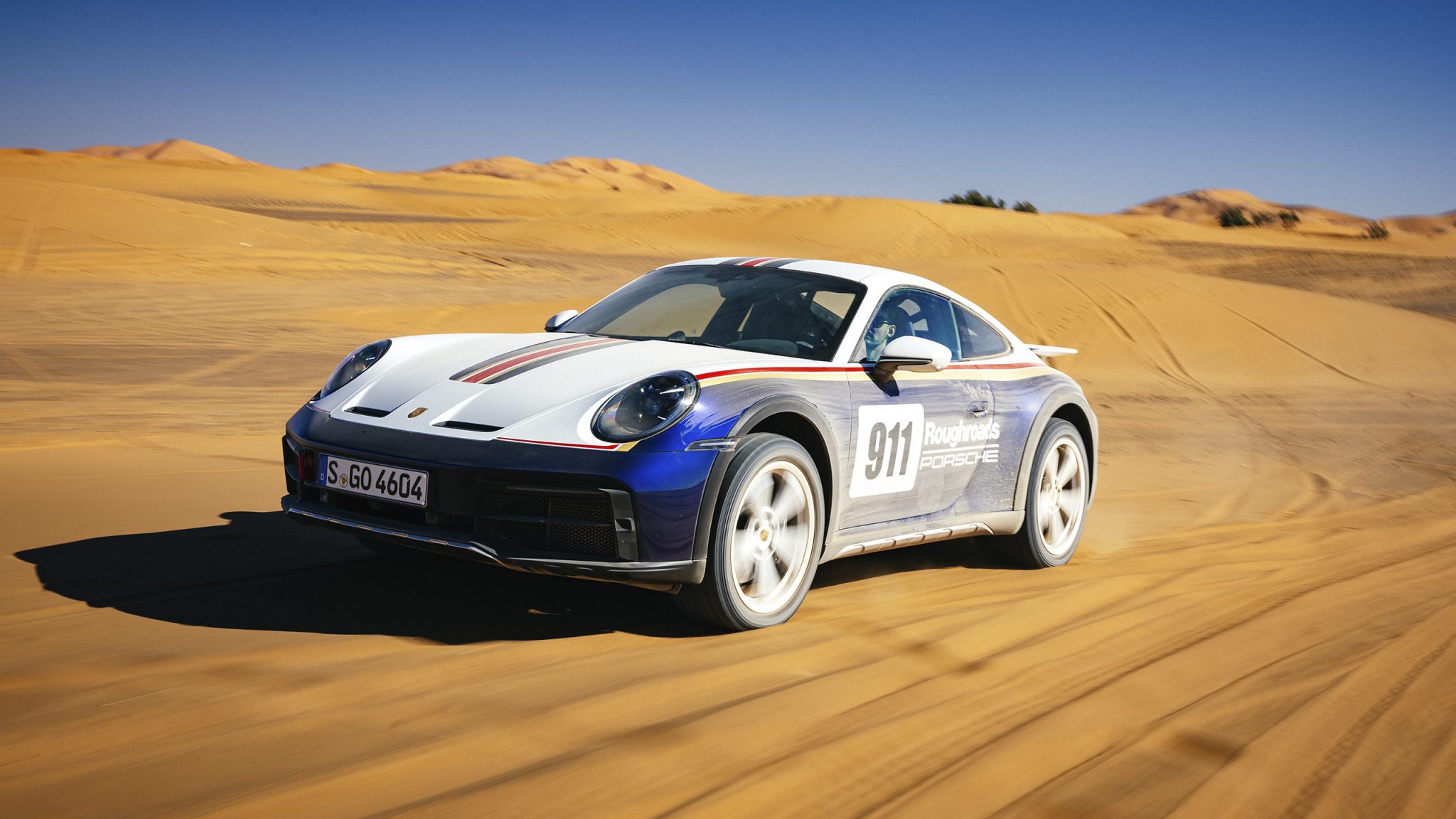 Three-quarter front view of a 2023 Porsche 911 Dakar