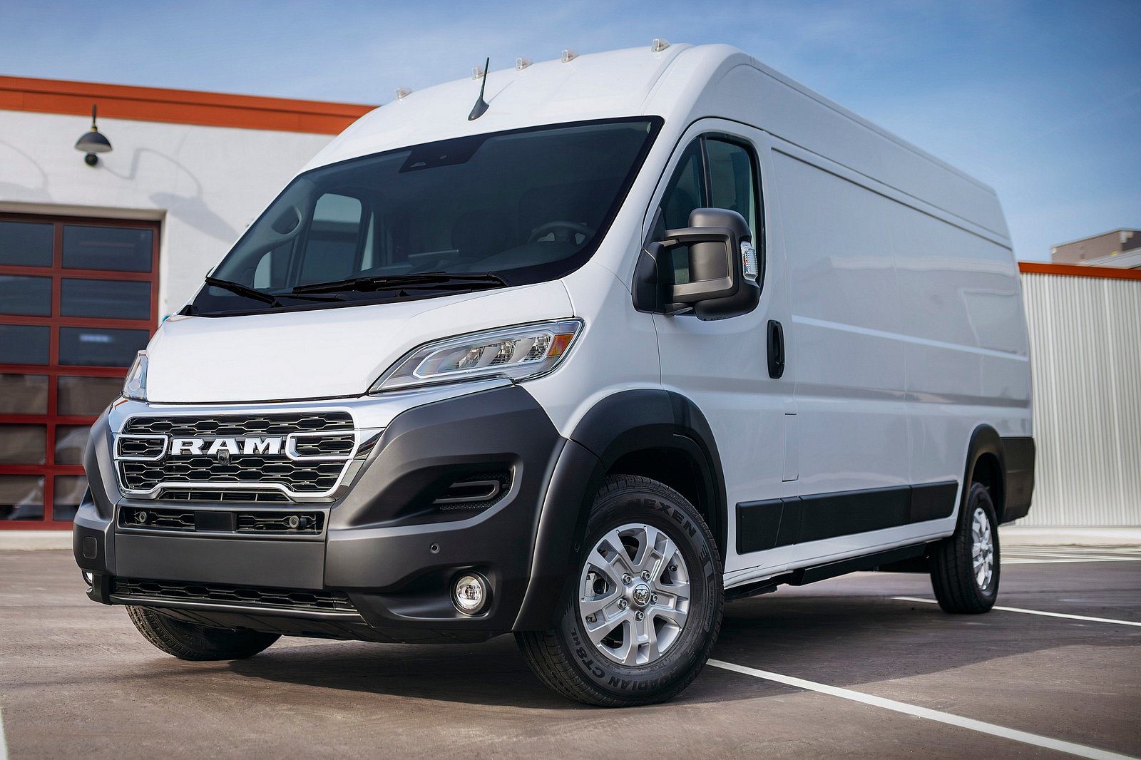 Front-angled view of a white 2024 RAM ProMaster EV.