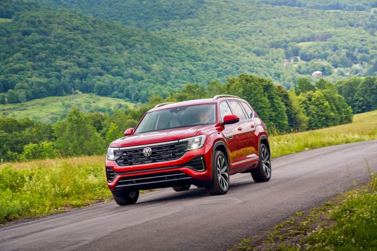 Three-quater front view of a 2024 red Volkswagen Atlas