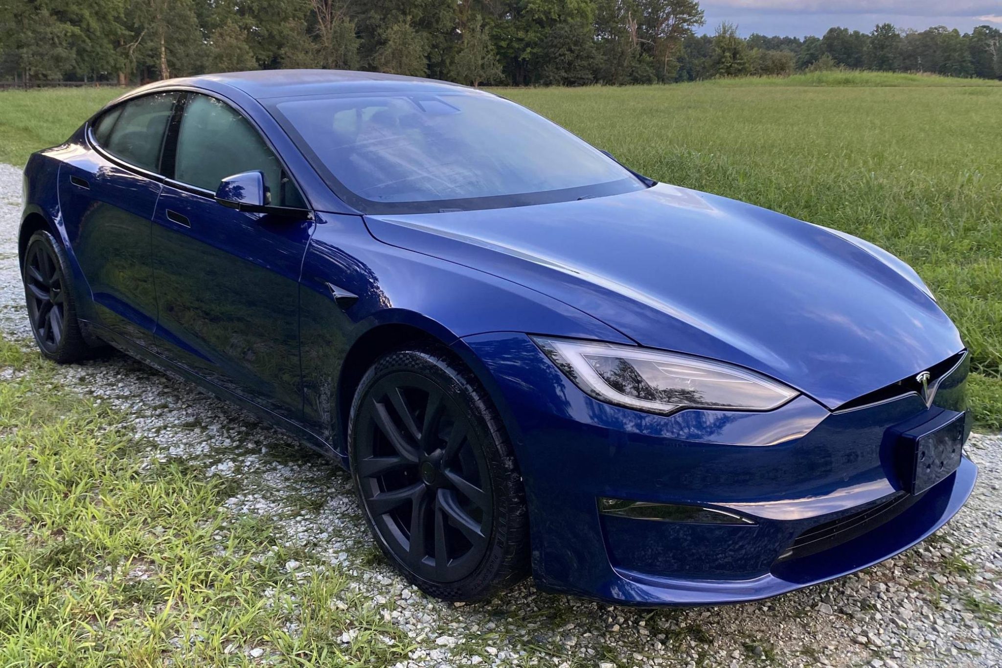 Front-angled view of a blue Tesla Model S