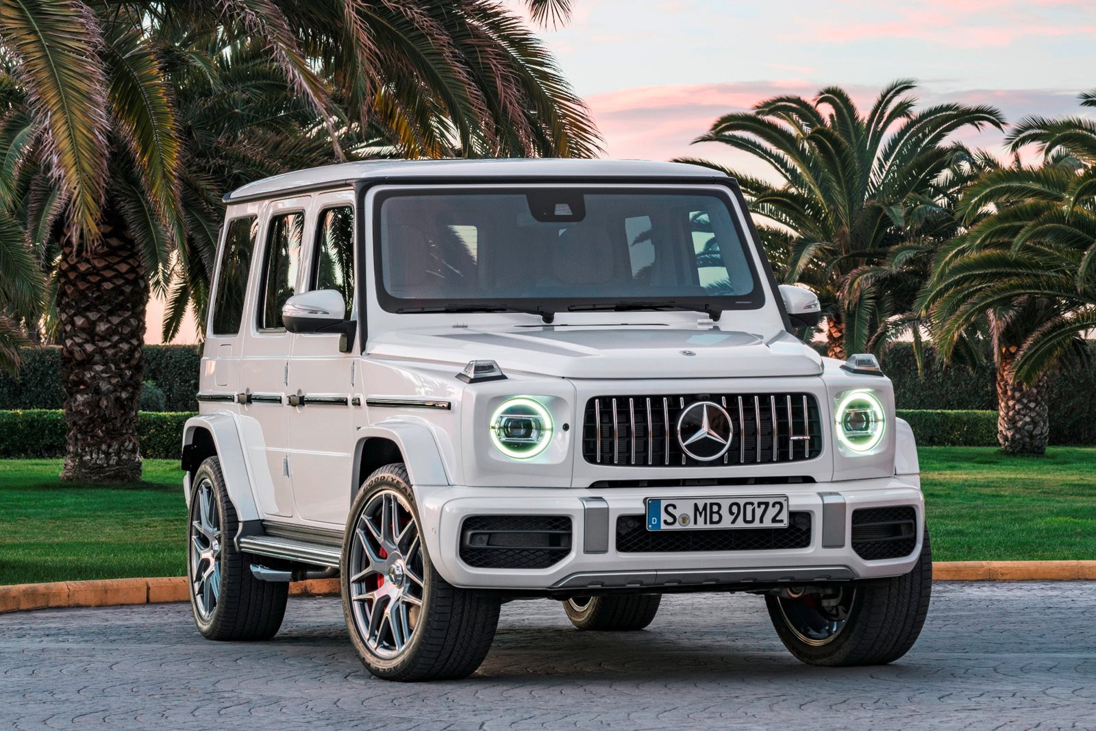 Front-angled view of a white Mercedes-AMG G63 SUV