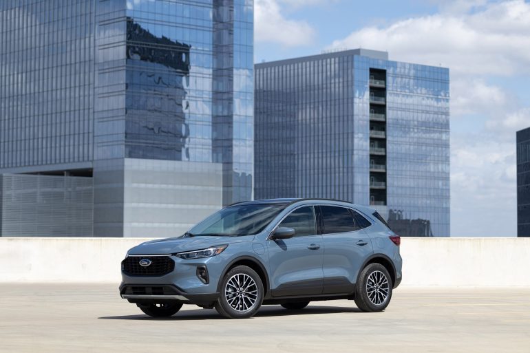 Three-quarter side view of a 2024 grey Ford Escape PHEV